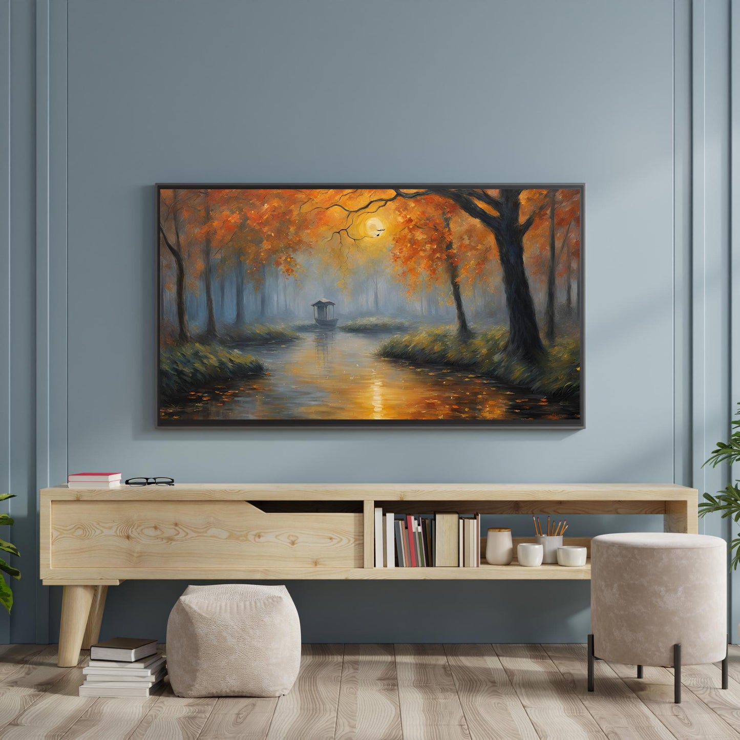 a painting hanging on a wall above a table