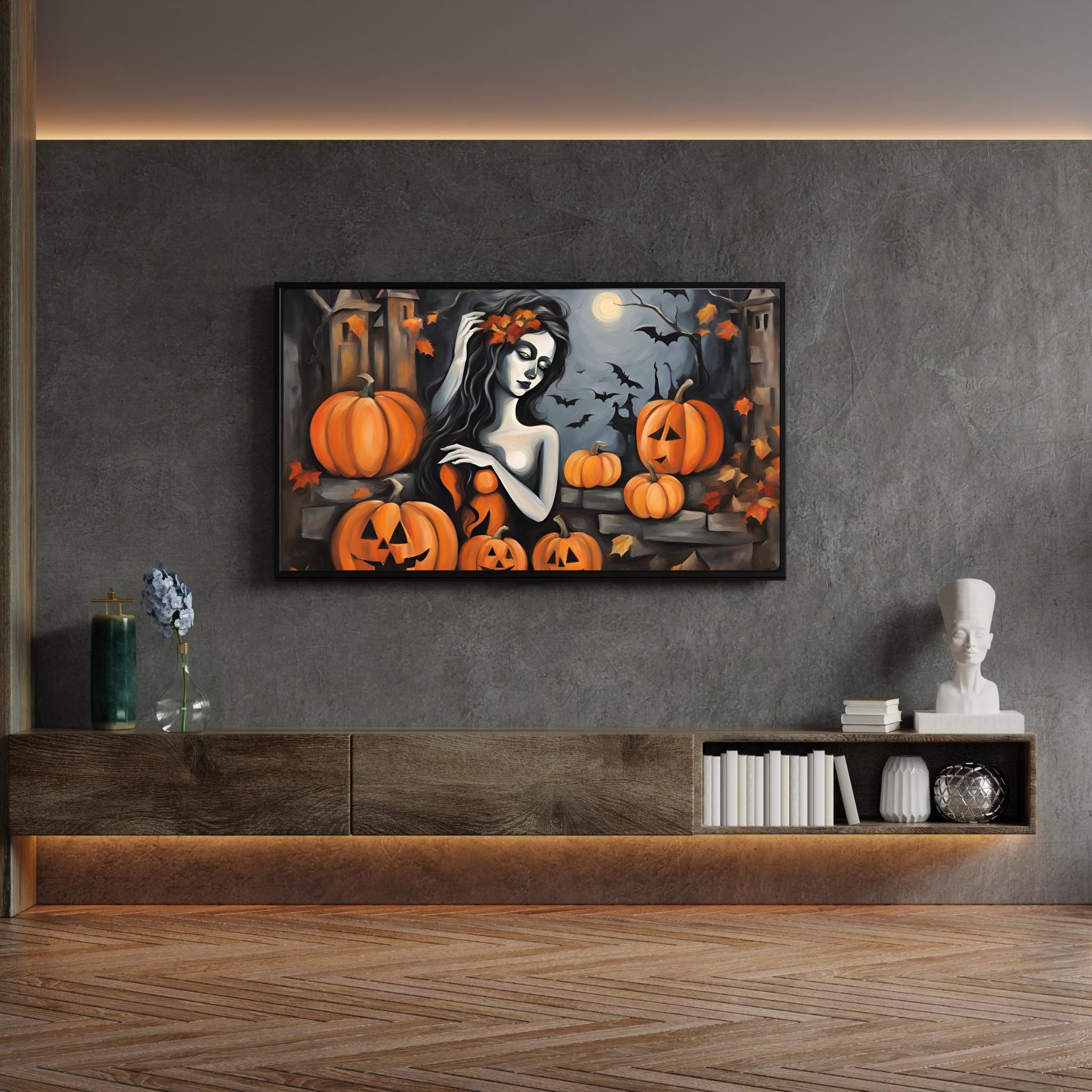 a living room with a painting of a woman and pumpkins